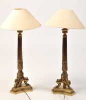 Lot 849 - *A pair of 20th Century lacquered brass table...