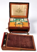 Lot 856 - *A 19th Century red leather and brass-bound...