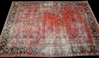 Lot 863 - *An early 20th Century Mahal carpet, the red...