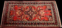 Lot 867 - A small Lilan rug, with foliate medallion and...