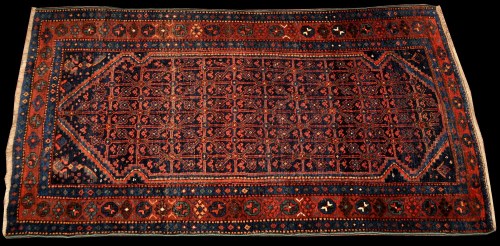 Lot 870 - An early 20th Century Luri rug, with repeated...