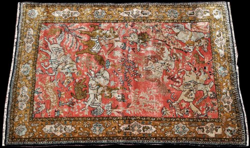 Lot 872 - A Persian silk Qum rug, decorated with hunting...