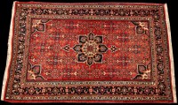 Lot 884 - A Bidjar rug, the central rosette surrounded...