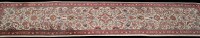 Lot 885 - A Persian Sarouk runner, the ivory ground...