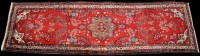 Lot 888 - A Mehraban runner, the red ground with central...