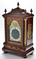 Lot 903 - A late 19th Century stained wood bracket clock,...