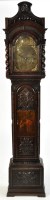 Lot 920 - Orme, Newport: a stained and carved oak...