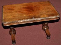 Lot 925 - A Regency rosewood library table, the rounded...