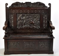 Lot 930 - A Victorian carved oak settle, the shaped...