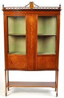 Lot 949 - An Edwardian inlaid mahogany china cabinet,...