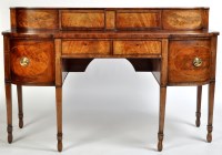 Lot 953 - An early 19th Century mahogany sideboard, the...