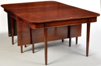 Lot 954 - A George III mahogany dining table, with...