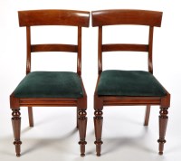 Lot 961 - Four early 19th Century mahogany dining chairs,...