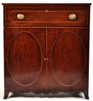 Lot 985 - A Sheraton period mahogany side cabinet,...