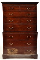 Lot 989 - A late George III mahogany tallboy, the dentil...