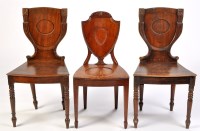 Lot 1041 - *A pair of early 19th Century mahogany hall...