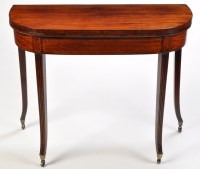 Lot 1051 - *A late George III mahogany D-shaped turnover...