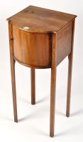 Lot 1054 - *A George III mahogany bowfront pot cupboard,...