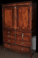 Lot 1057 - *A converted George III mahogany wardrobe, the...