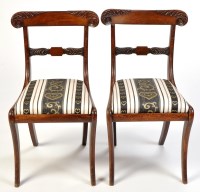 Lot 1066 - *Two Regency simulated rosewood dining chairs,...