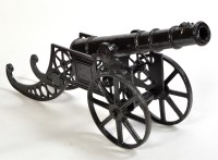 Lot 1070 - *A cast iron and later black painted signal...