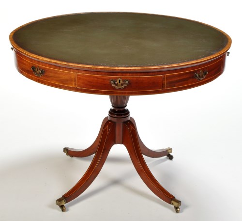 Lot 1073 - A late Georgian circular mahogany drum table,...