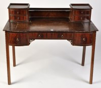 Lot 1099 - An early 20th Century mahogany desk, by Maple...