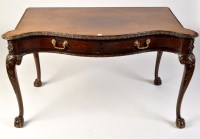 Lot 1100 - A George III style mahogany serpentine side...