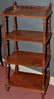 Lot 1104 - A Victorian mahogany four-tier whatnot, with...