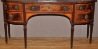 Lot 1108 - A Georgian style inlaid mahogany breakfront...