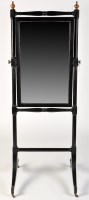 Lot 1119 - *A 19th Century ebonised cheval mirror, the...