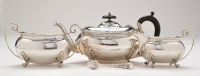 Lot 560 - A George V three-piece tea service, by J....