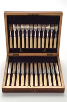 Lot 575 - A set of twelve Victorian silver and ivory...