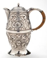 Lot 607 - A George III hot water jug, by John Schofield,...