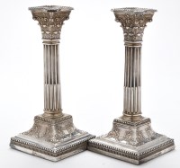 Lot 619 - A pair of Victorian candlesticks, by James...