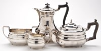 Lot 635 - A George V four-piece tea service, by Huttons,...