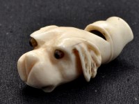 Lot 651 - A late Victorian ivory whistle in the shape of...