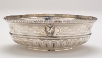 Lot 668 - A French bowl, circular, with embossed lion...