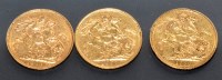 Lot 672 - A Victorian gold sovereign, 1882; and two...