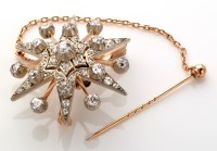 Lot 703 - A Victorian diamond set star pattern brooch,...