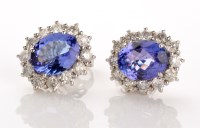 Lot 707 - A pair tanzanite and diamond cluster earrings,...