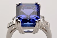Lot 708 - An tanzanite and diamond ring, the emerald-cut...
