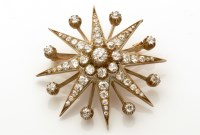 Lot 712 - A Victorian diamond star pattern brooch, the...