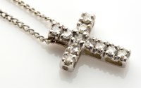 Lot 770 - A diamond set crucifix pattern pendant, the...