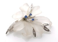 Lot 779 - A diamond, sapphire and cut glass flower...