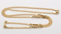 Lot 799 - An 18ct. yellow gold fancy chain necklace, of...