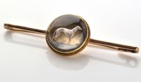 Lot 806 - A Victorian glass intaglio brooch, the glass...
