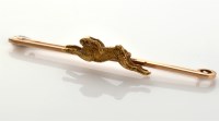 Lot 807 - A yellow metal hare pattern brooch, the hare...