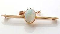 Lot 809 - A Victorian opal brooch, the oval opal...