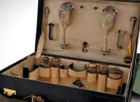 Lot 835 - A black stained crocodile skin dressing case,...